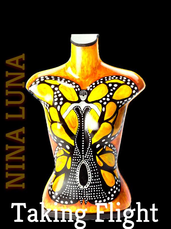 Decorative butterfly design on a torso-shaped object with text 'NINA LUNA' and 'Taking Flight'.